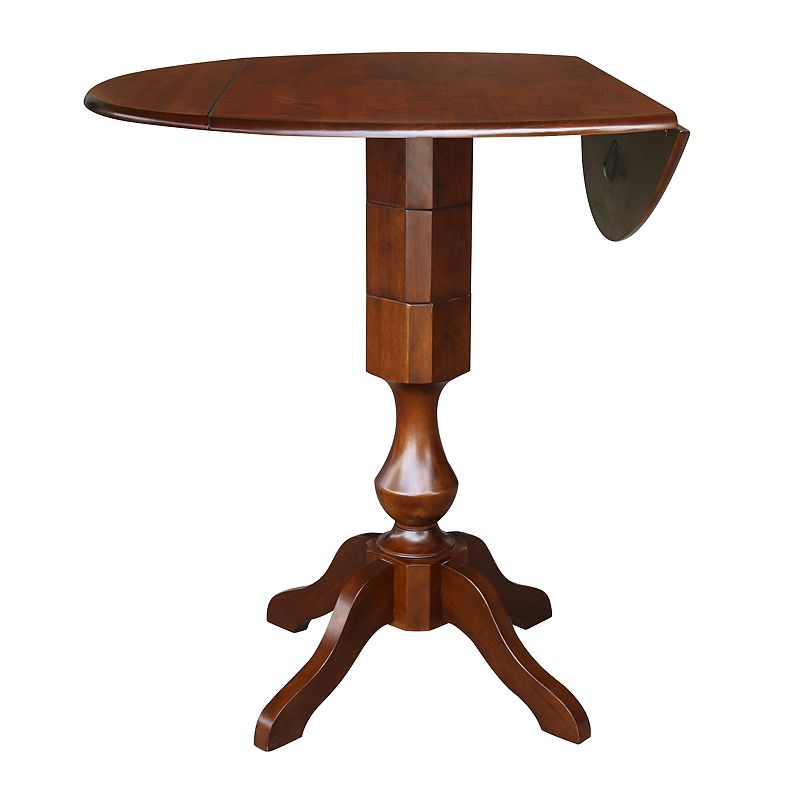 International Concepts Round Dual Drop Leaf Pedestal Dining Table