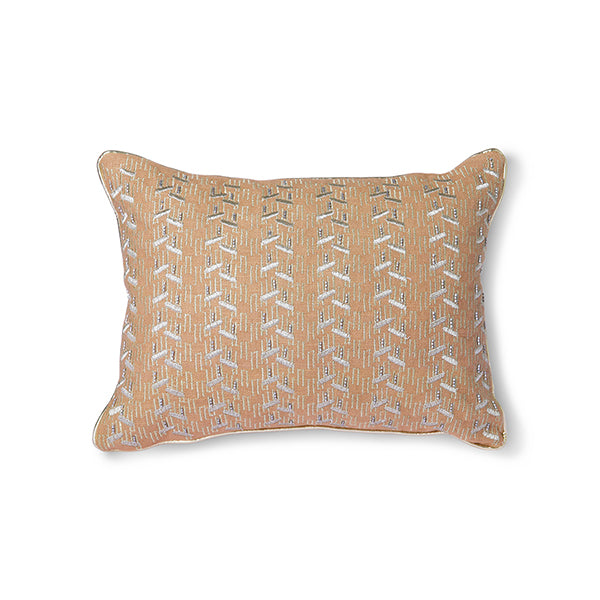 Nude pillow with silver trim