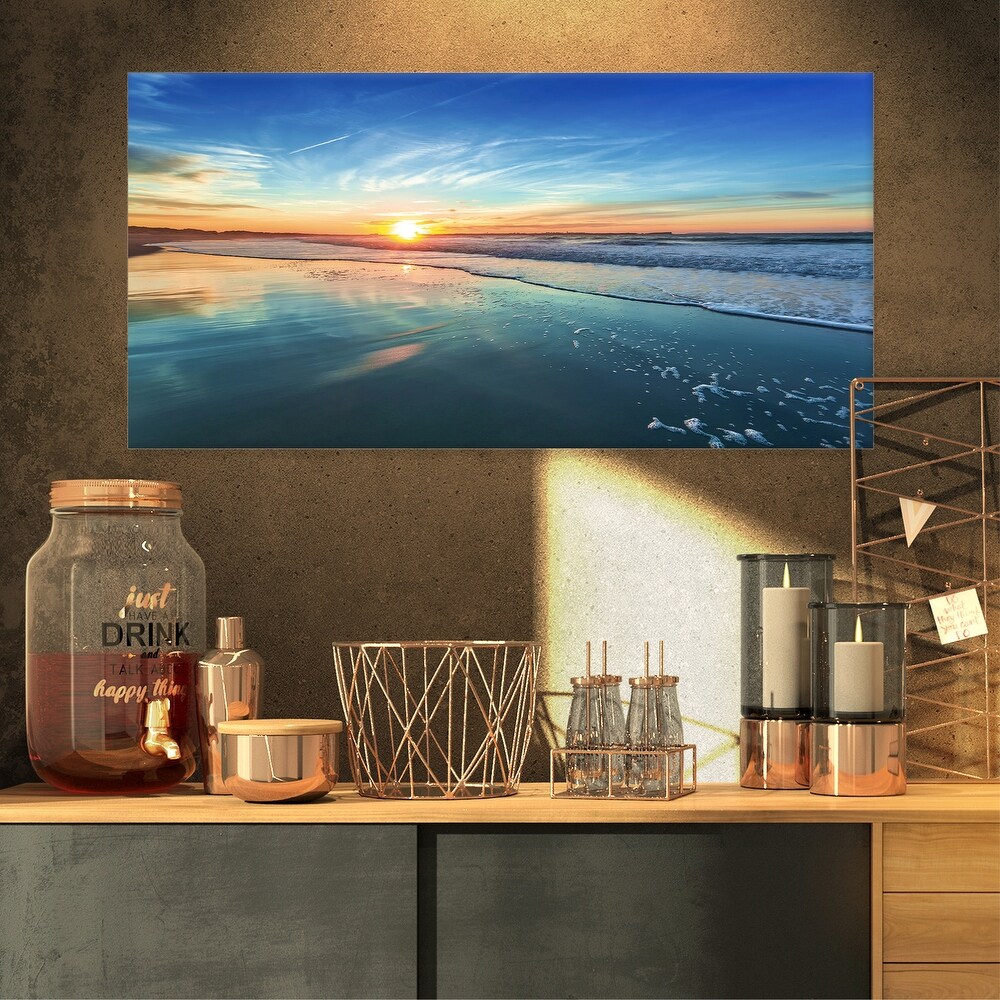 Blue Seashore with Distant Sunset   Seashore Canvas Wall Art