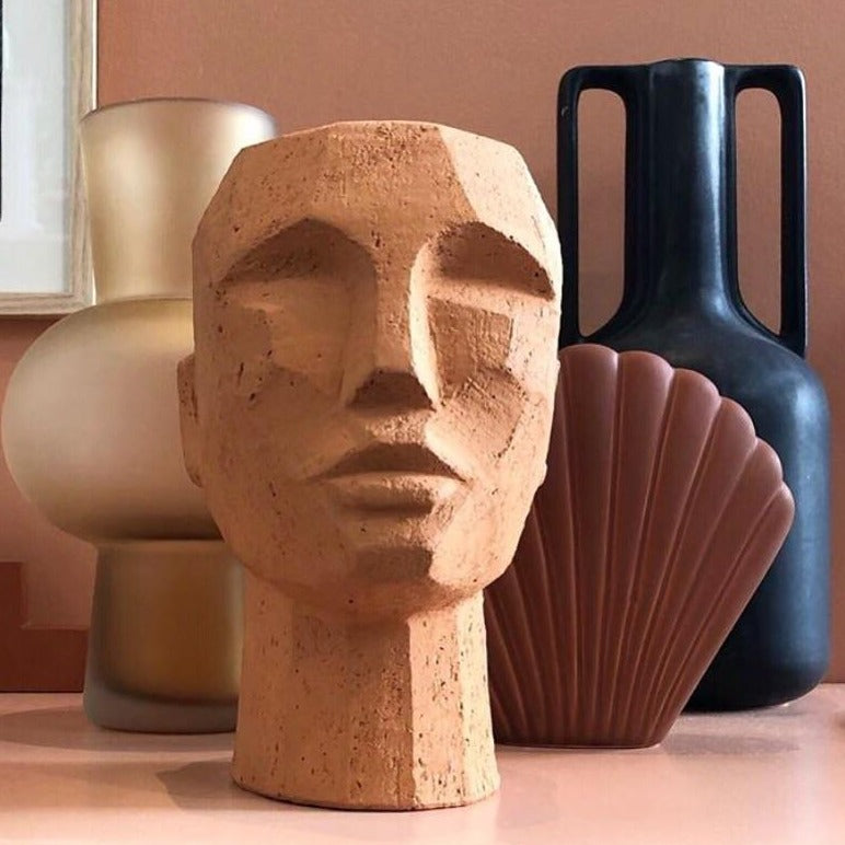 Terracotta head sculpture