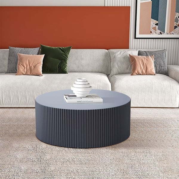 Contemporary Round Coffee Table with Handcrafted Relief