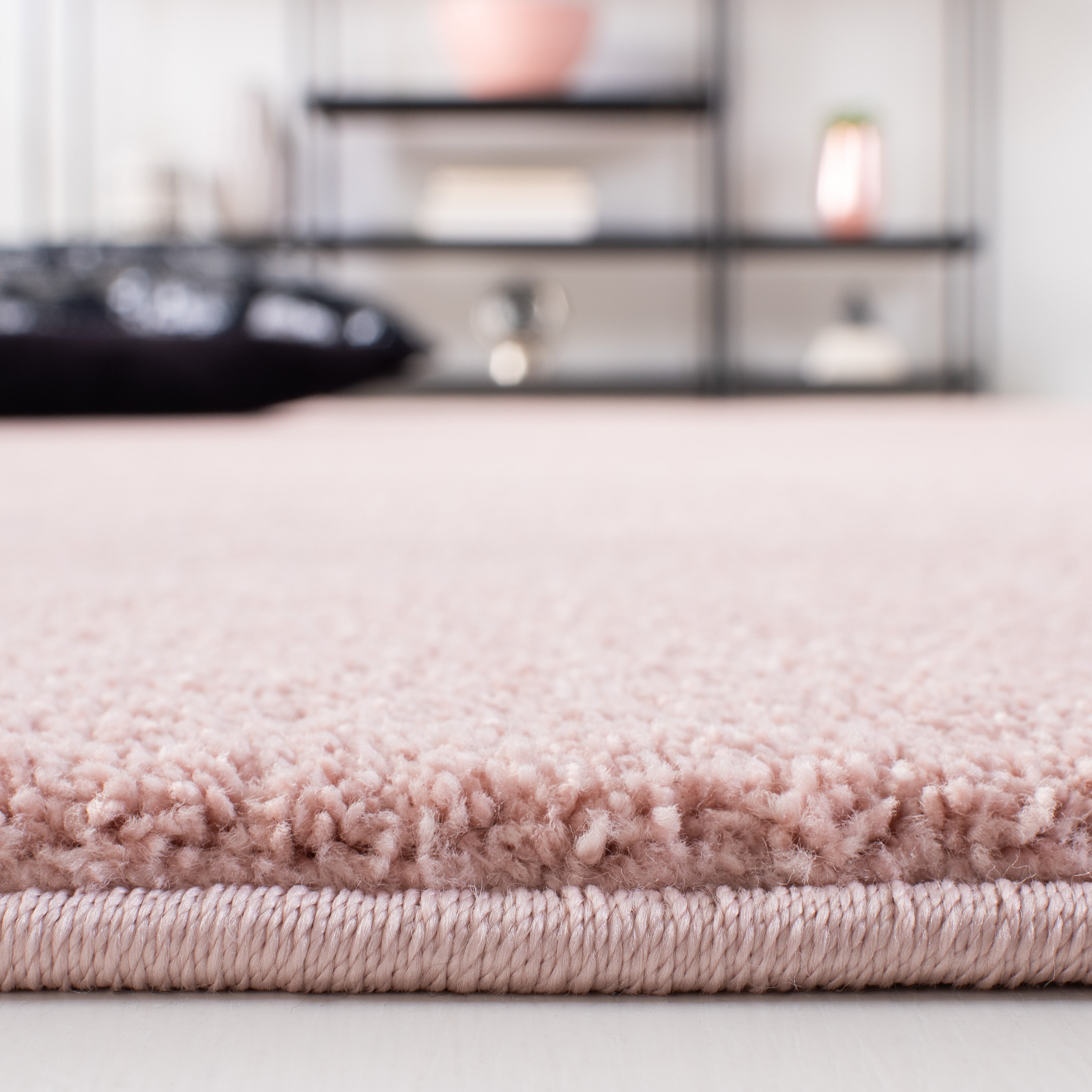 SAFAVIEH Plain and Solid Carleen Solid Plush Area Rug, Pink, 5'5