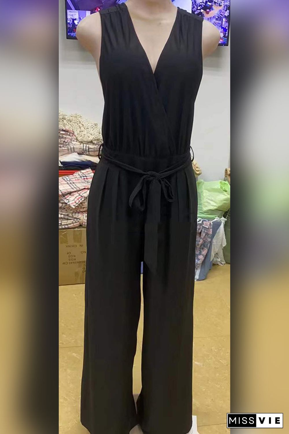 Sleeveless V-Neck Backless Flared Pants Jumpsuit Wholesale