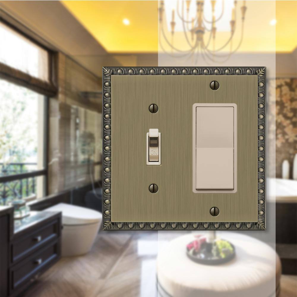 AMERELLE Antiquity 2 Gang 1-Toggle and 1-Rocker Metal Wall Plate - Brushed Brass 90TRBB