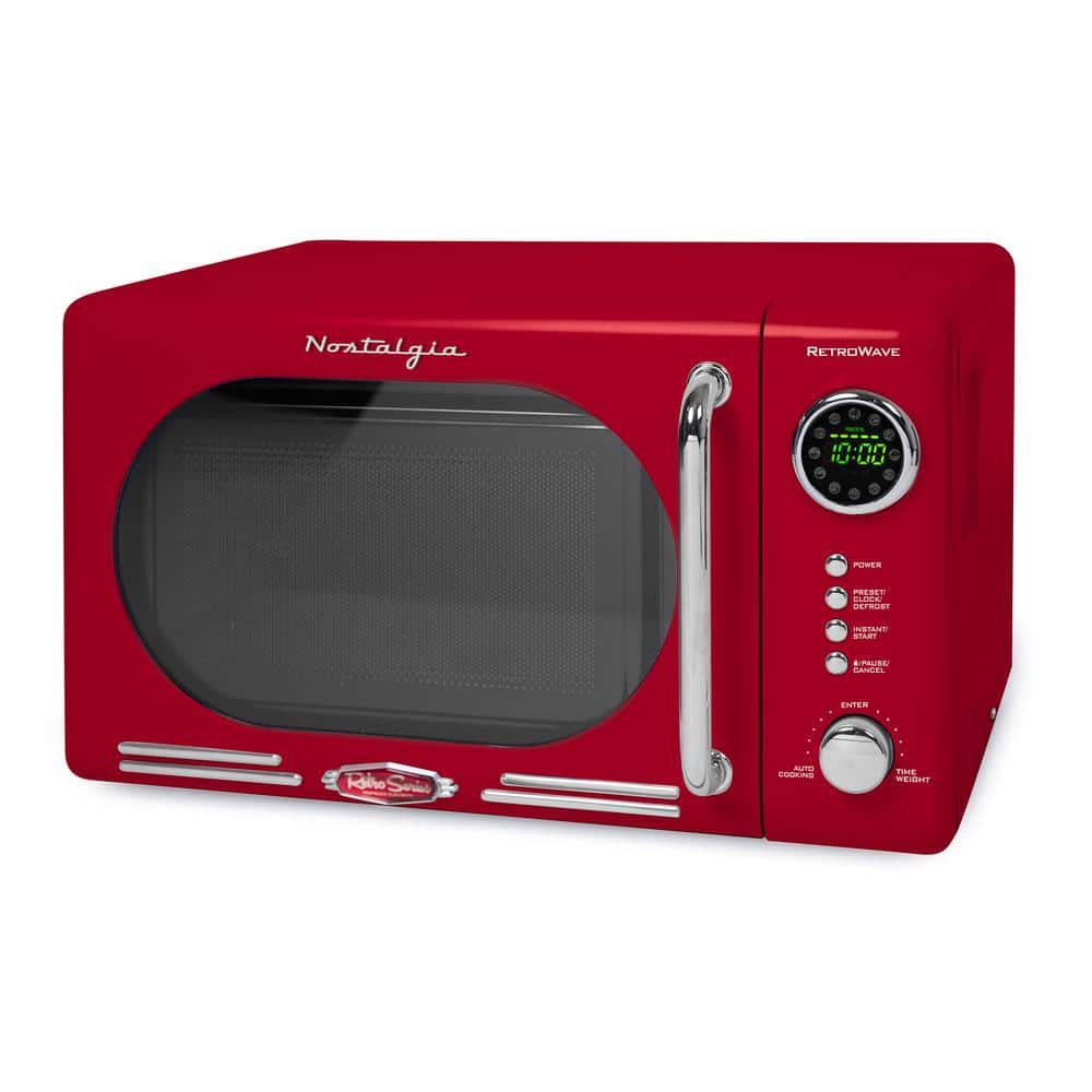 Nostalgia Retro 07 cu ft 700Watt Countertop Microwave Oven in Red