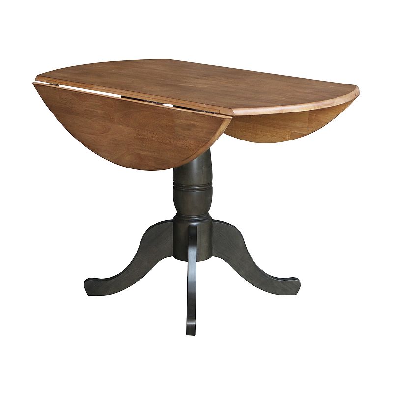 International Concepts Pedestal Round Dual Drop Leaf Dining Table