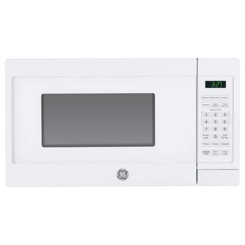 GE 07 Cu Ft Spacemaker Countertop Microwave Oven in White