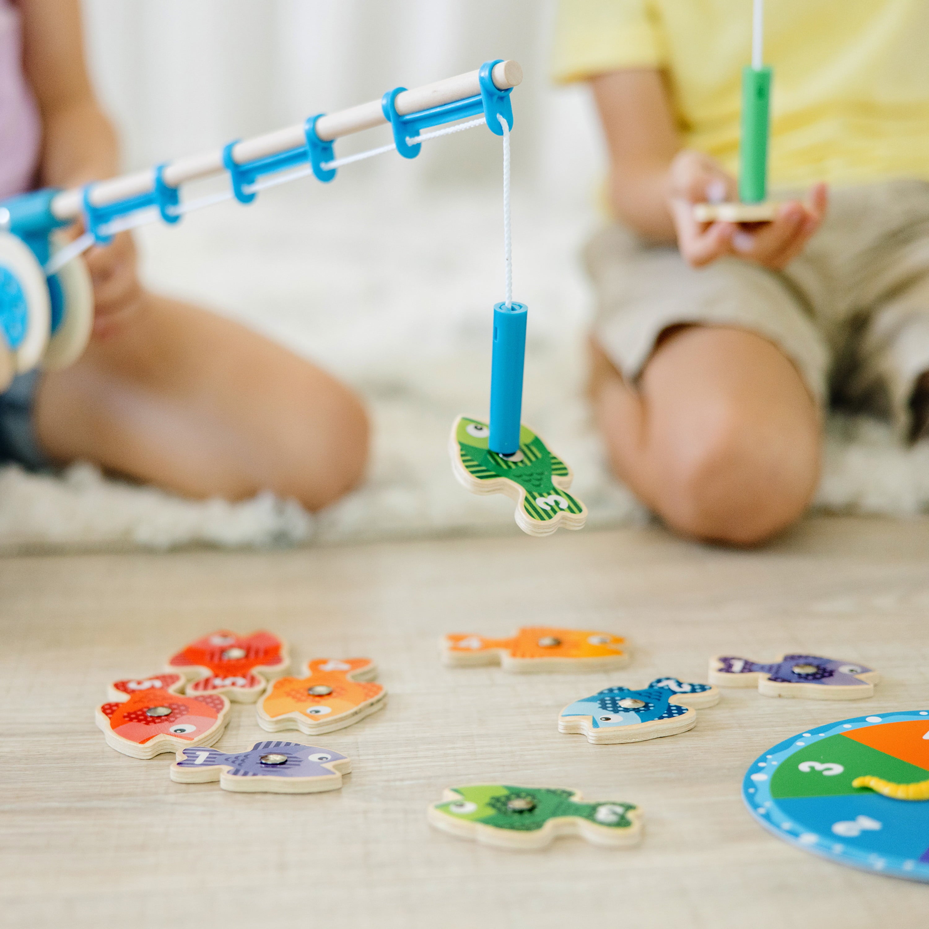 Melissa and Doug Catch and Count Wooden Fishing Game With 2 Magnetic Rods