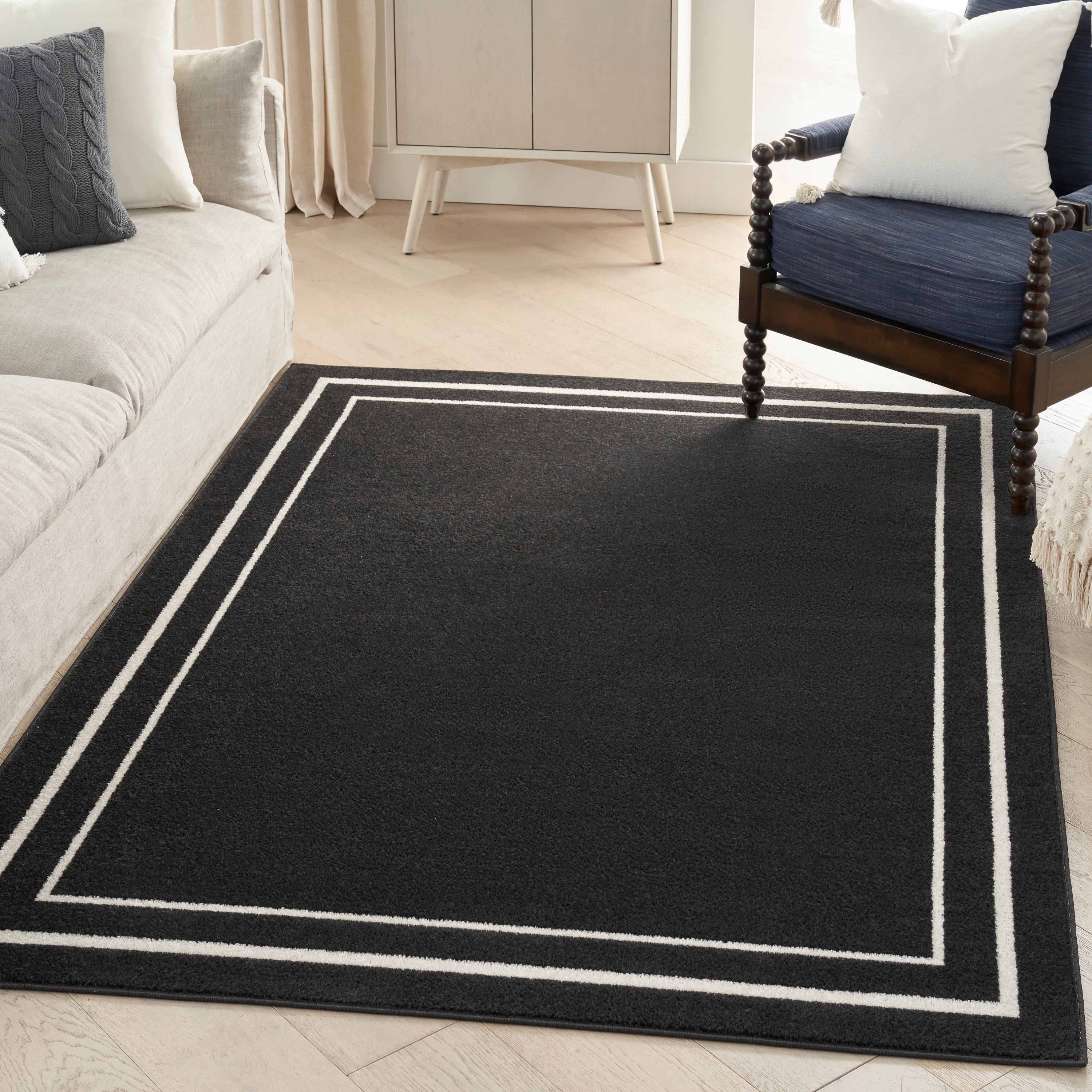 Nourison Essentials Black Ivory Rug