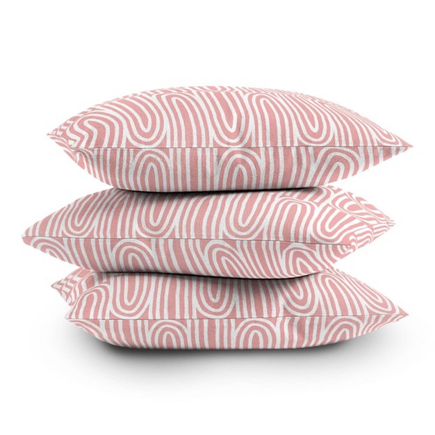 Mirimo Bows Outdoor Throw Pillow Pink white Deny Designs