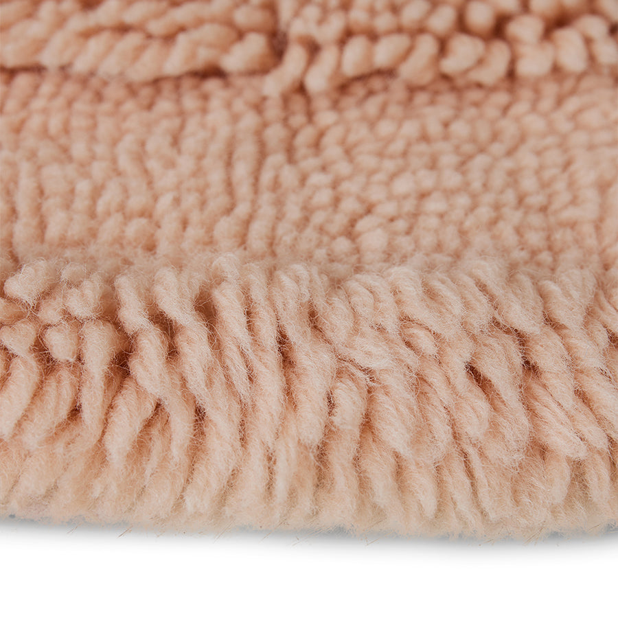 Round woolen rug soft pink