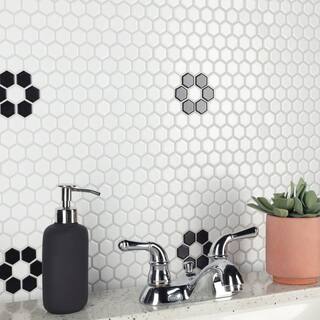 Merola Tile Metro 1 in. Hex Matte White with Single Flower 10-14 in. x 11-78 in. Porcelain Mosaic Tile (8.6 sq. ft.Case) FXLM1HMF