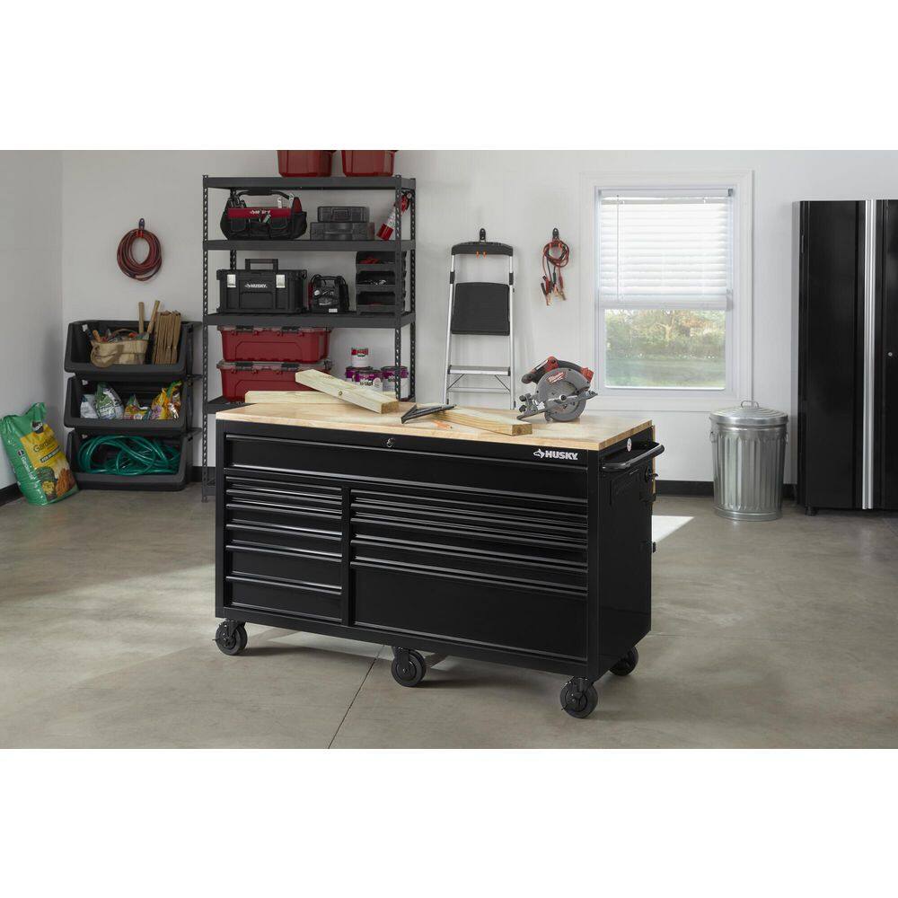 Husky 62 in. W x 36 in. D Standard Duty 12-Drawer Mobile Workbench Tool Chest with Full Length Extension Table in All Black HOTC6212B11M