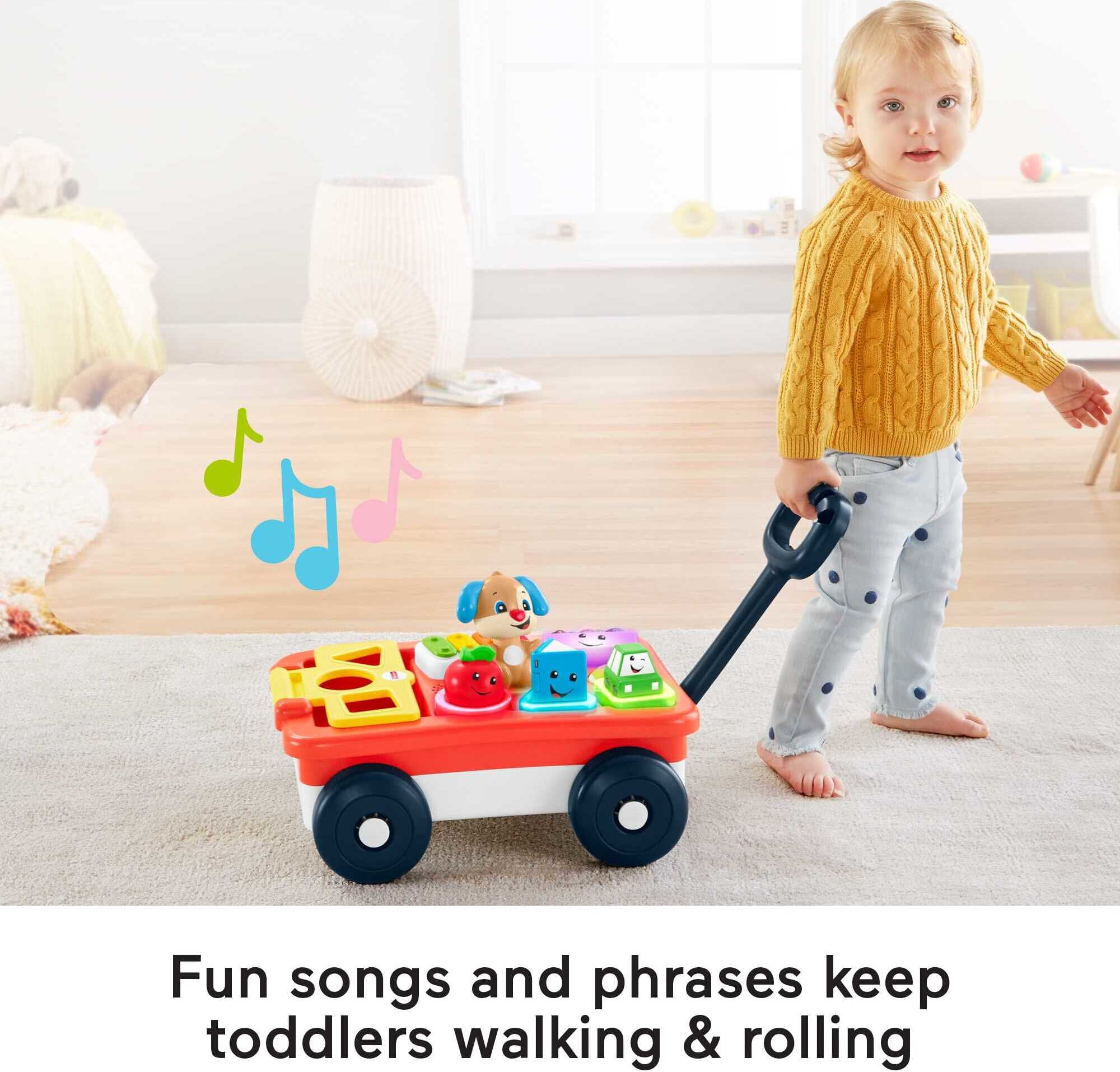 Fisher-Price Laugh and Learn Pull and Play Learning Wagon Baby and Toddler Toy with 4 Accessories
