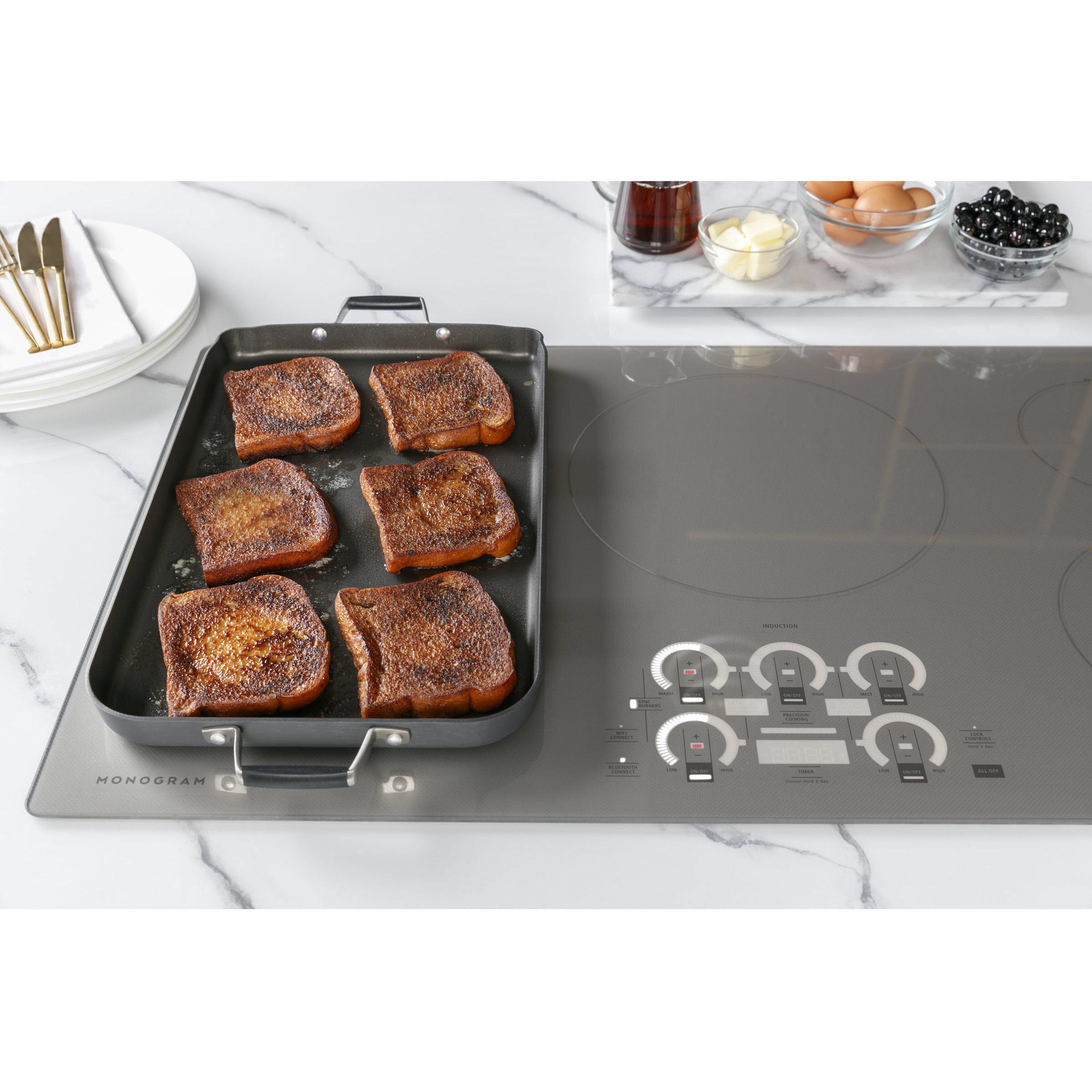 Monogram 36-inch Built-in Induction Cooktop with Wi-Fi Connect ZHU36RSTSS