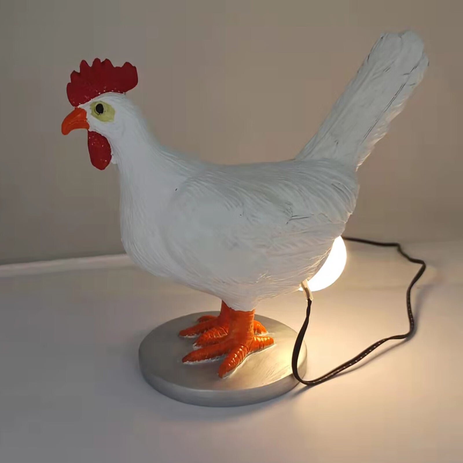 This Taxidermy Chicken Eggs Lamp Exists and We Begrudgingly Love It