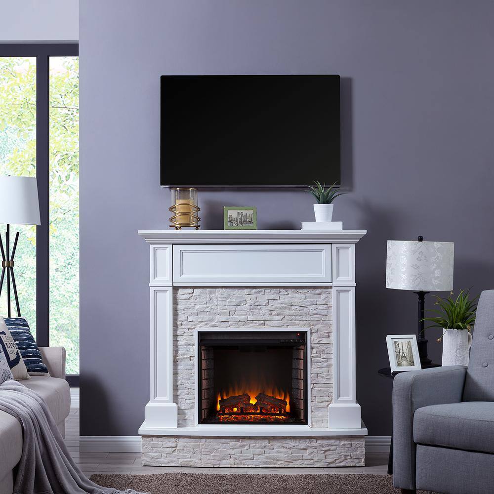 Southern Enterprises Johnna 48 in. Faux Stone Media Electric Fireplace in White HD685205