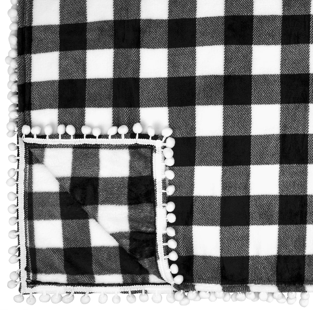 PAVILIA Fleece Throw Blanket with Pom Pom Fringe | Buffalo Plaid Checkered White， Black Flannel Throw | Super Soft Lightweight Microfiber Polyester | Plush， Fuzzy， Cozy | 50 x 60 Inches