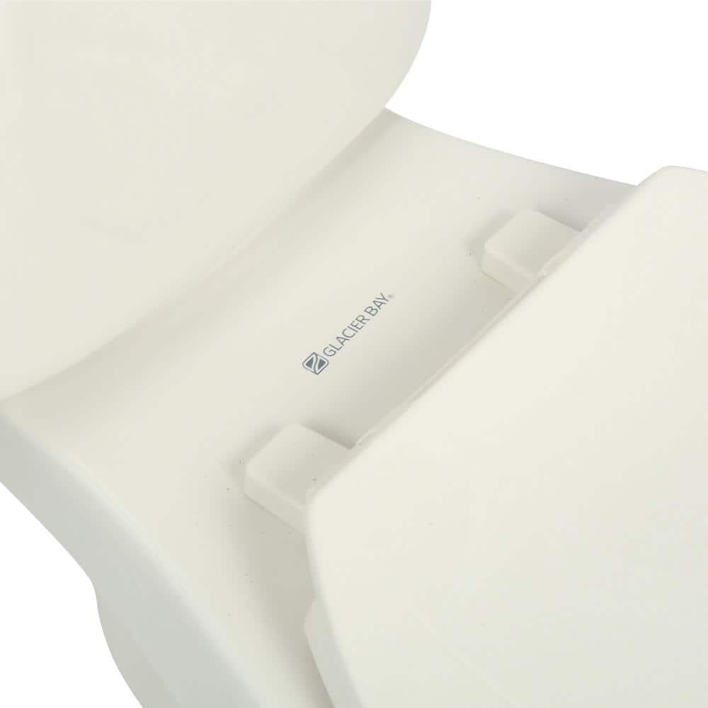 Glacier Bay 2piece 128 GPF High Efficiency Single Flush Elongated Toilet in Biscuit