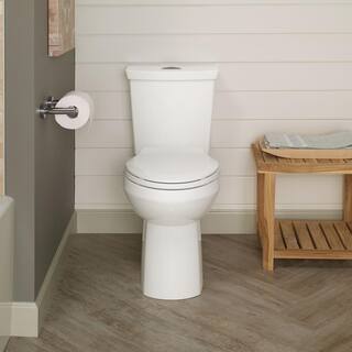 American Standard Cadet 3 in. Tall Height 2-piece 1.0 1.6 GPF Dual Flush Elongated Toilet in White Seat Included 3380.216ST.020