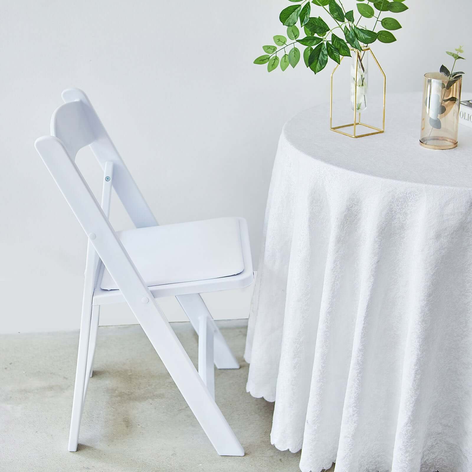 White Resin Folding Chair With Vinyl Padded Seat For Weddings, Indoor or Outdoor Events