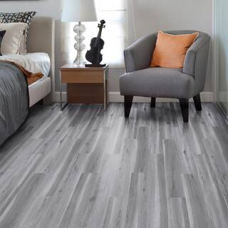 TrafficMaster Alberta Spruce 4 MIL x 6 in. W x 36 in. L Grip Strip Water Resistant Luxury Vinyl Plank Flooring (24 sqftcase) 821958