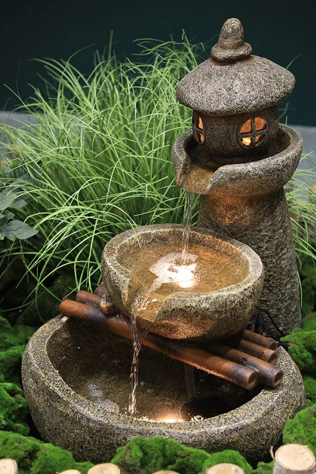 water fountain Kumquat big cylinder birch fence fence bamboo stone spring flowing water generous stone lamp artificial landscape