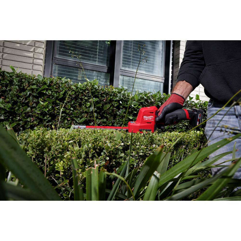 MW M12 FUEL 8 in. 12V Lithium-Ion Brushless Cordless Hedge Trimmer Kit and M18 FUEL 16 in. Chainsaw Combo Kit (2-Tool) 2533-21-2727-21HD