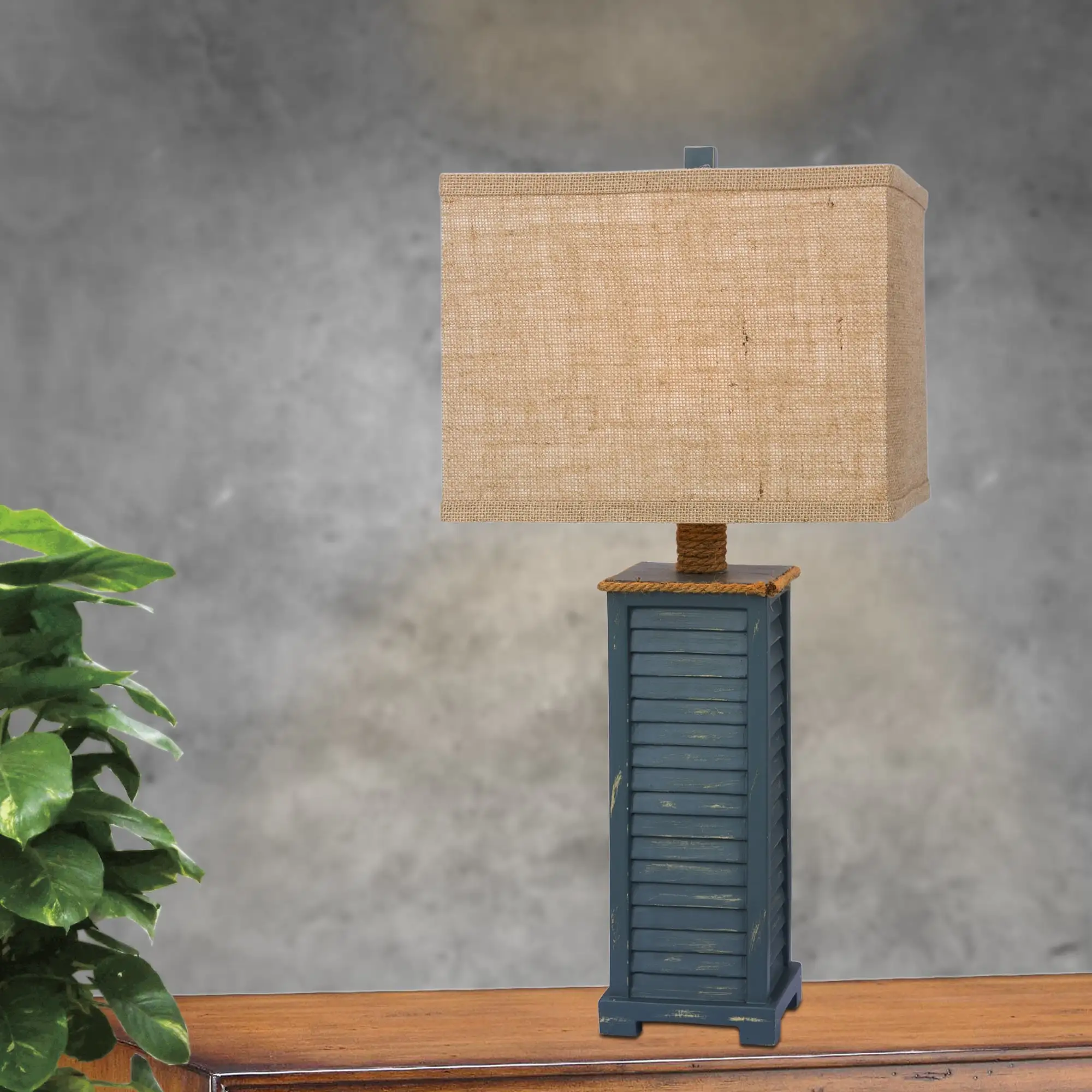 Fangio Lighting's 25.5 in. Resin Table Lamp in an Antique Blue Finish