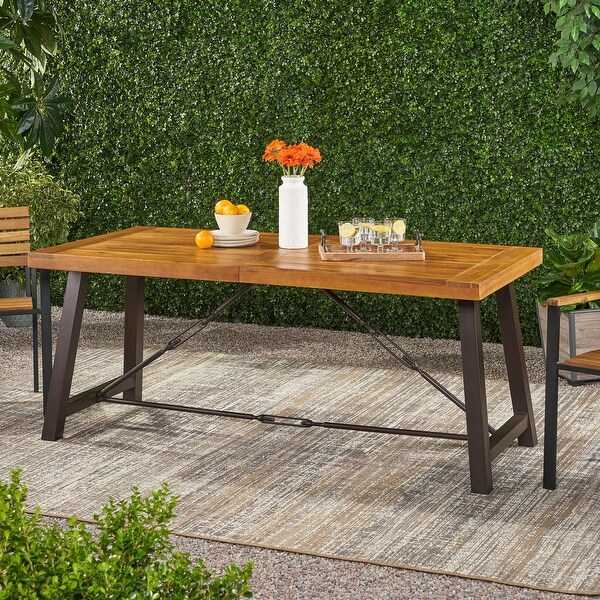 Outdoor Dining Table with Sleek Wooden Slats and a Powdercoated Frame