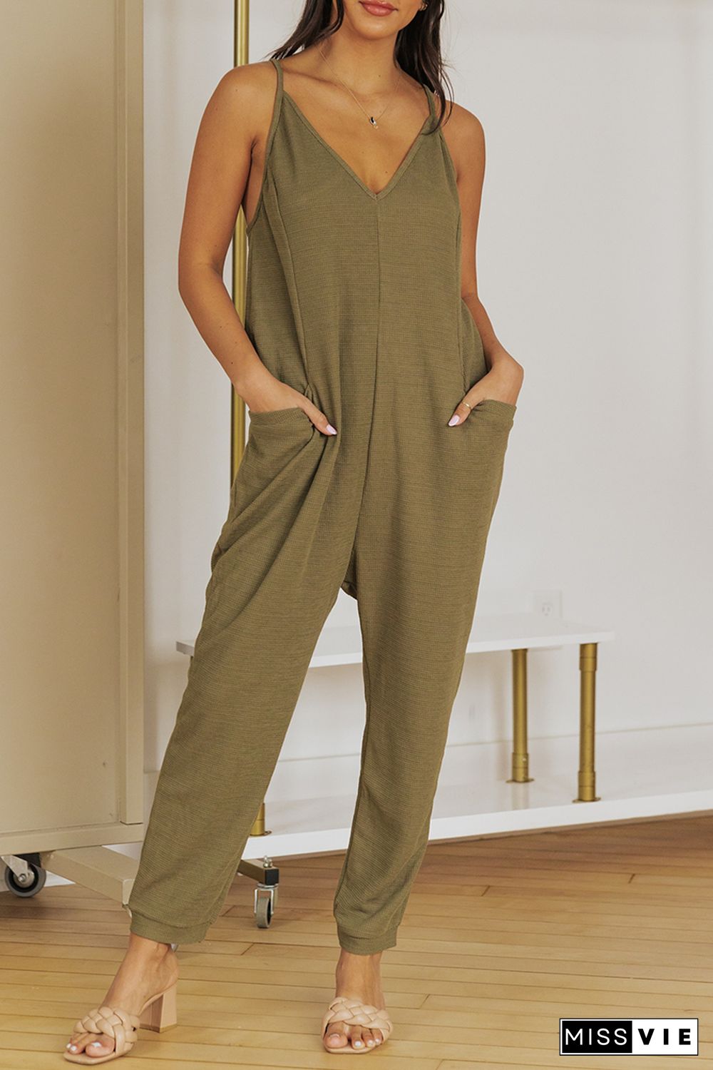 Green Textured Sleeveless V-Neck Pocketed Casual Jumpsuit