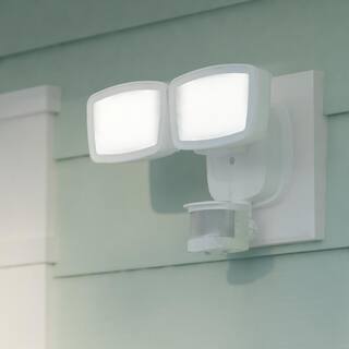 dualux 180-Degree Range - 70 ft. White Outdoor Integrated LED Motion Sensor Dusk to Dawn Security Flood Light T0698