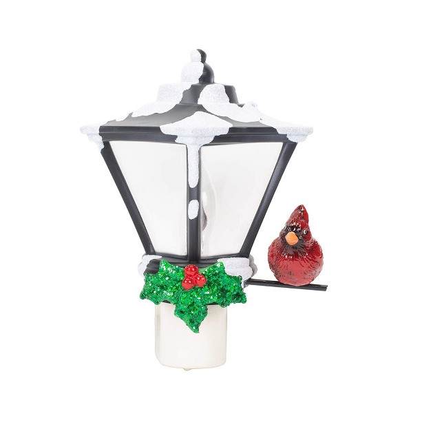 Cardinal On A Snow Covered Street Lamp Flickering Christmas Night Light