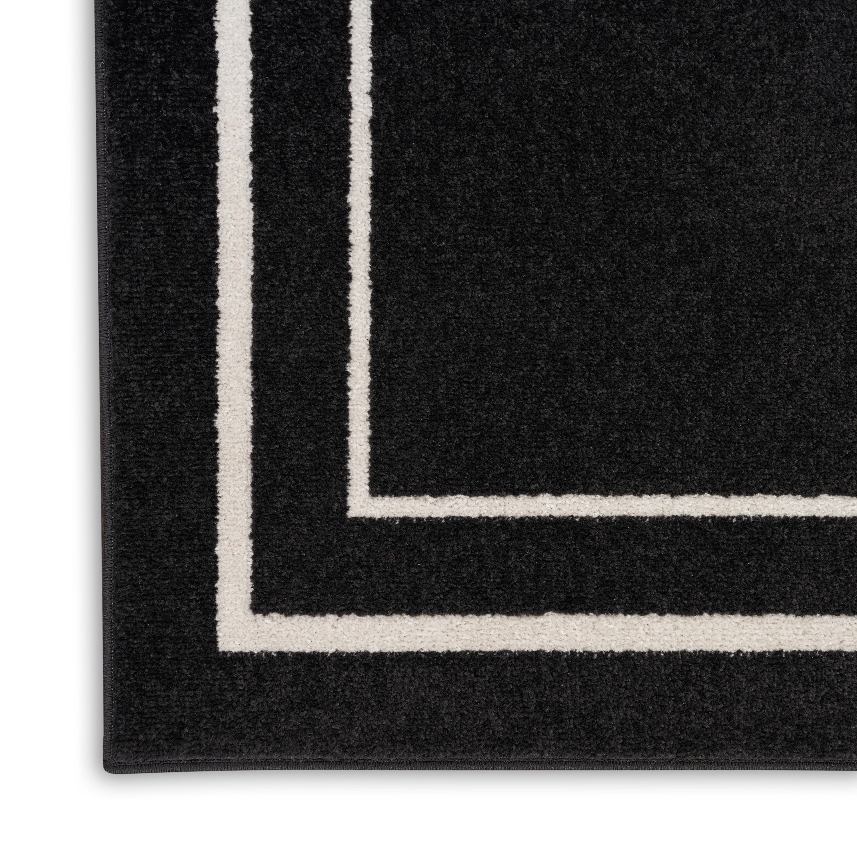 Nourison Essentials Black Ivory Rug