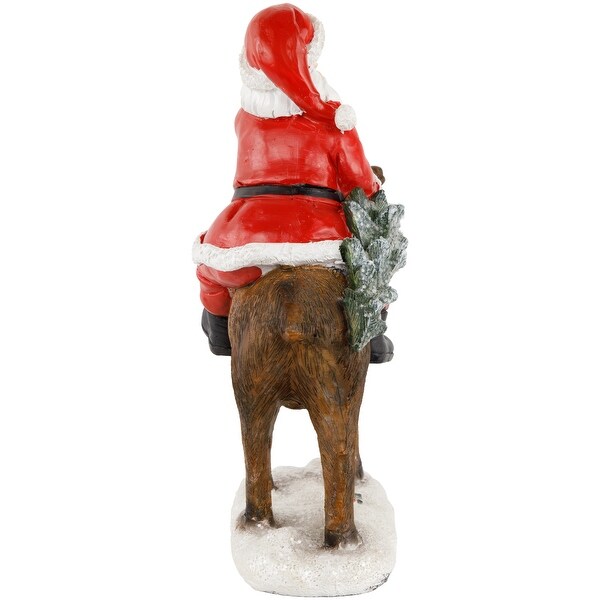 Santa Claus on a Reindeer Holding a Frosted Pine Tree Christmas Figurine