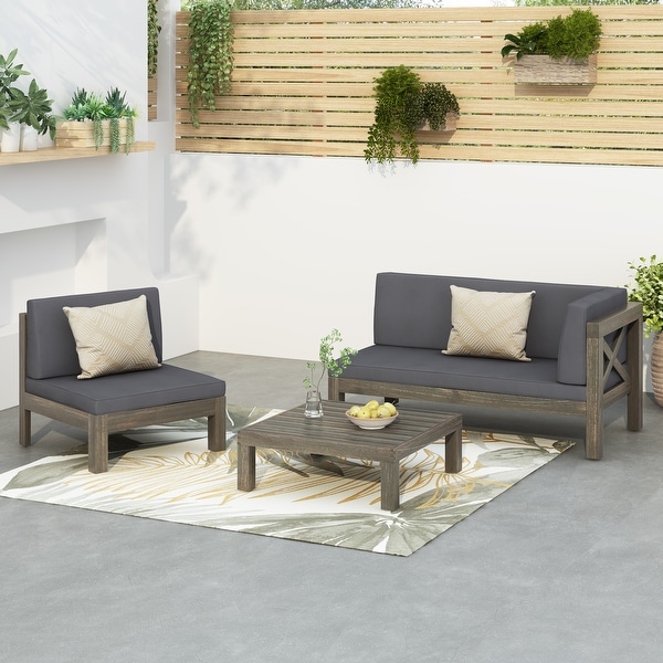 Brava Outdoor Acacia Wood Right Arm Loveseat Coffee Table and Chair Conversation Set with Cushions by Christopher Knight Home