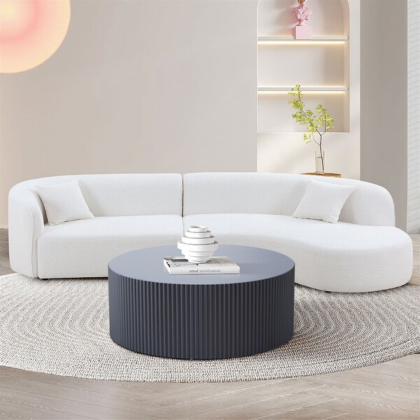 Contemporary Round Coffee Table with Handcrafted Relief