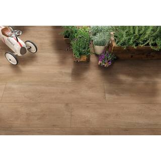 MSI 12 in. x 48 in. Lukas Brown Porcelain Paver Tile Brown (8 sq. ft.Case) LHDPAVNLBE1248C