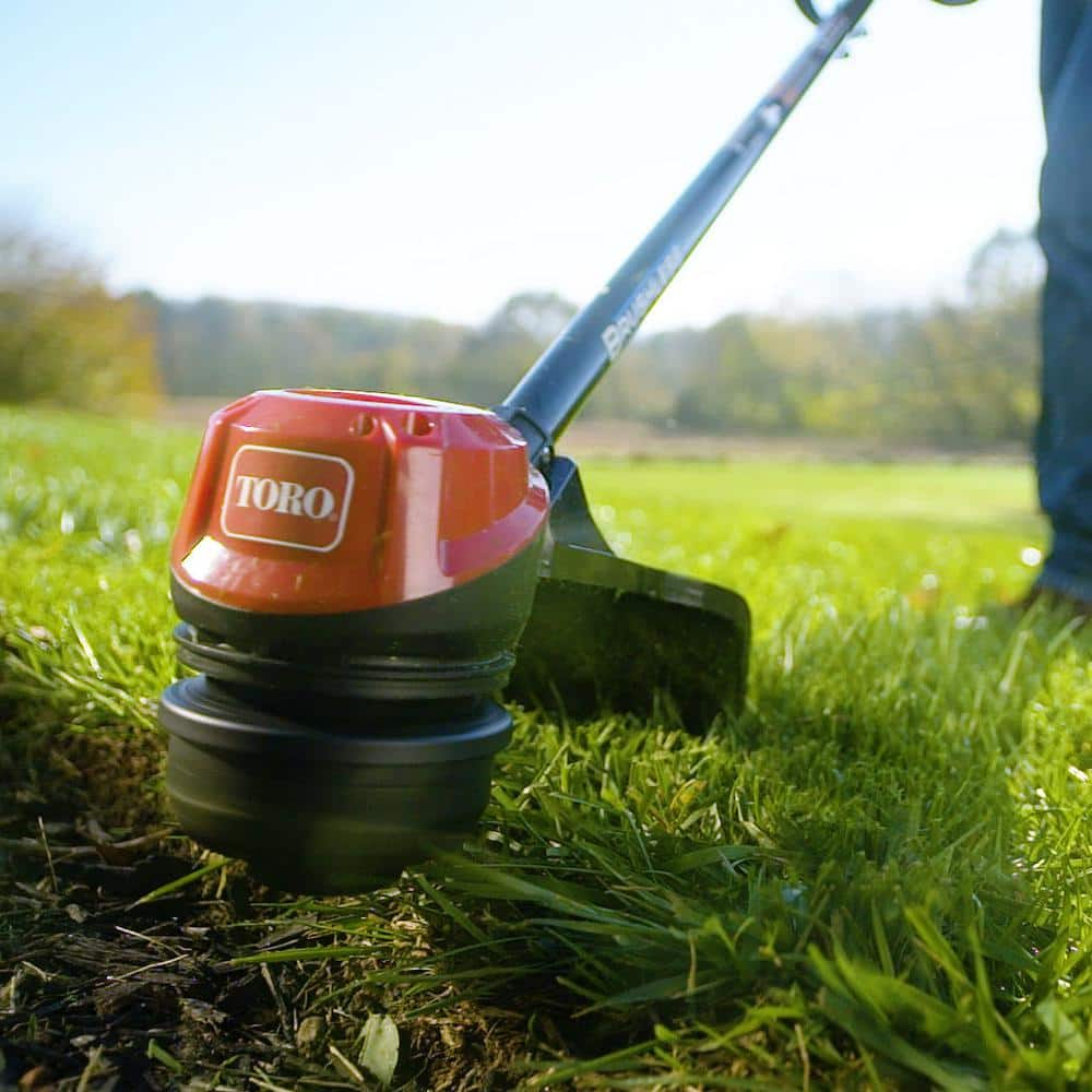 Toro 60V Max Lithium-Ion Brushless Cordless 15 in. / 13 in. String Trimmer - 2.0 Ah Battery and Charger Included 51831