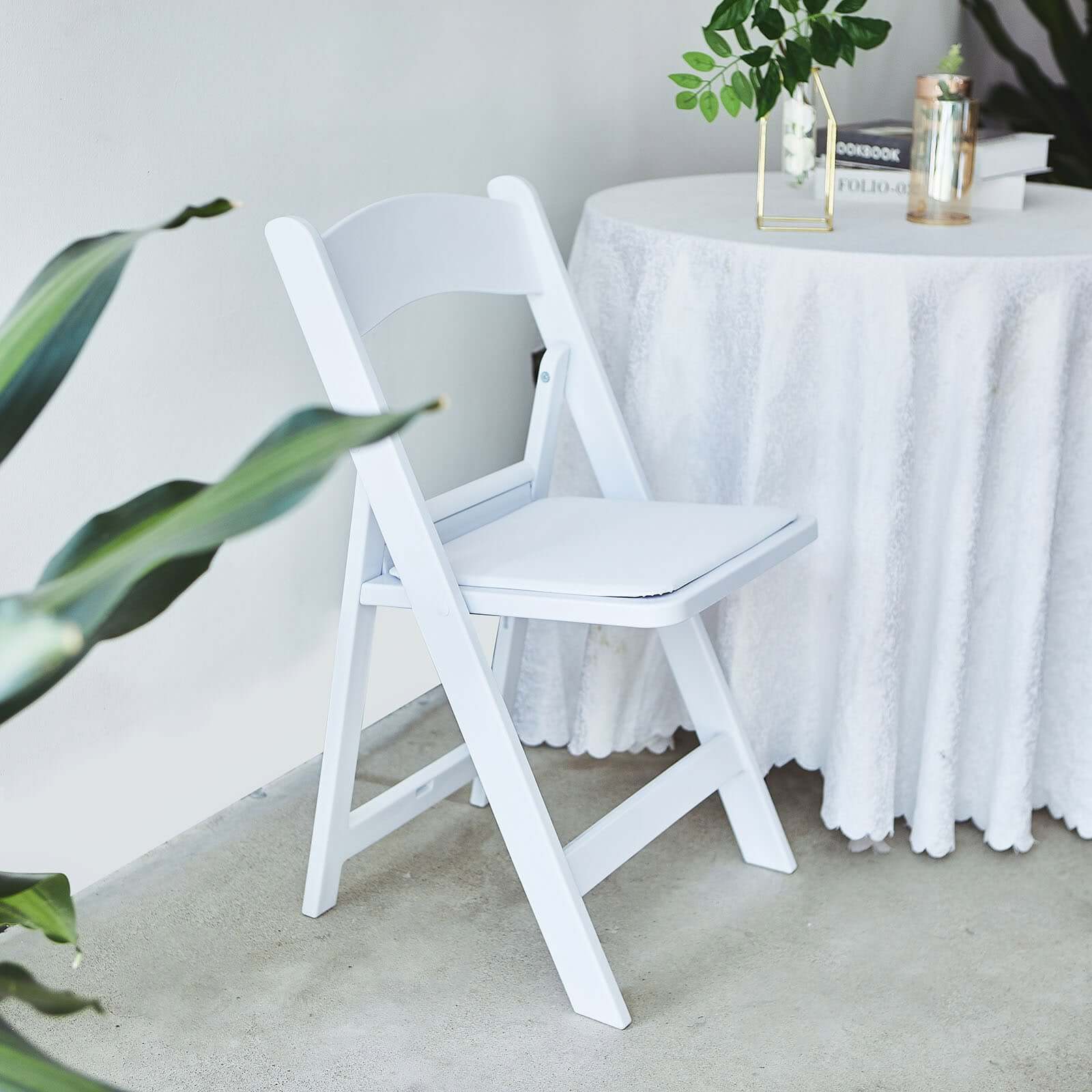 White Resin Folding Chair With Vinyl Padded Seat For Weddings, Indoor or Outdoor Events