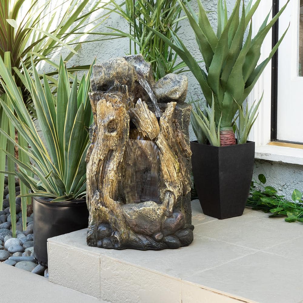 Alpine Corporation 22 in. Tall Outdoor Rainforest Tree Trunk and Stone Waterfall Fountain with LED Lights WIN270S