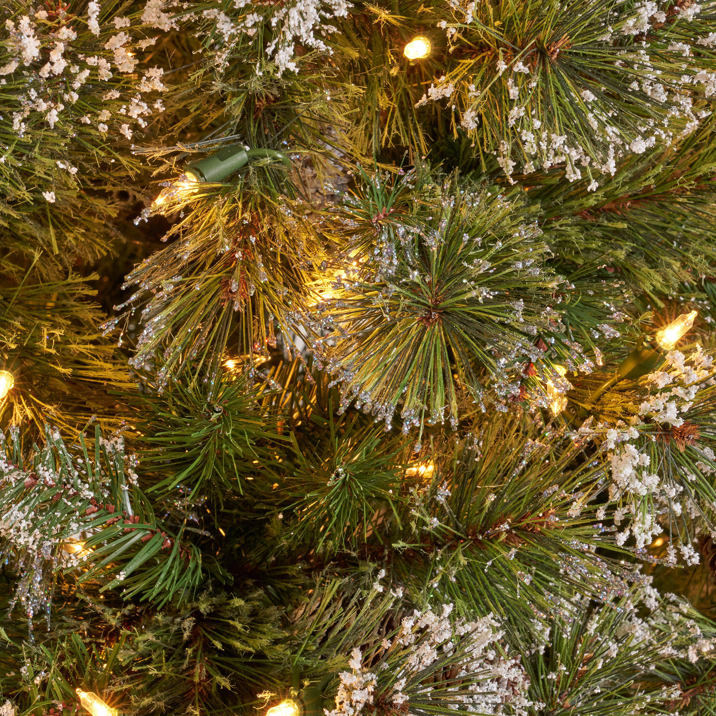 9-foot Mixed Spruce Hinged Artificial Christmas Tree with Snow and Glitter Branches and Frosted Pinecones