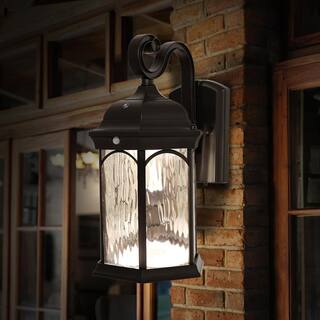 Home Decorators Collection Bronze Integrated LED Outdoor Wall Lantern Sconce with Flickering BulbClear Glass with Motion Sensor and Photocell FL-381HD