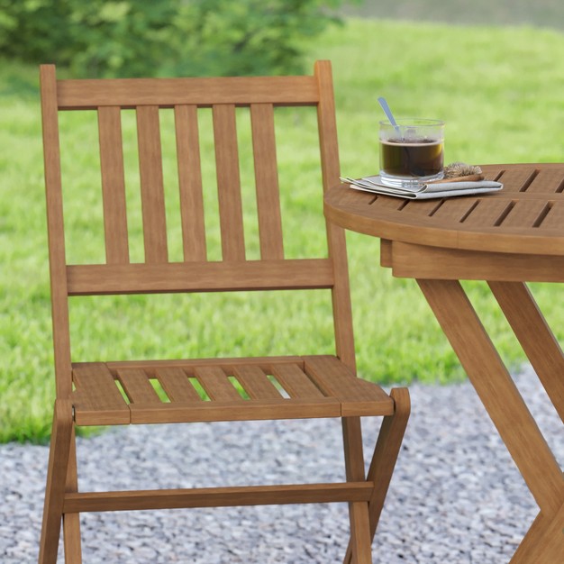 Emma And Oliver All weather Three Piece Solid Acacia Wood Patio Bistro Set With Two Folding Chairs And Table