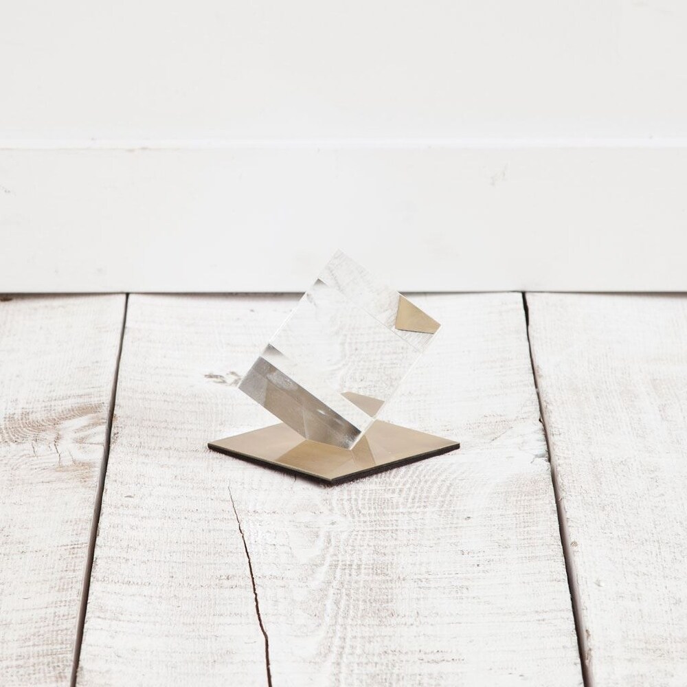 Optical Glass Cube and Gold Sculpture