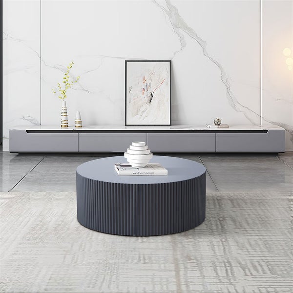 Contemporary Round Coffee Table with Handcrafted Relief