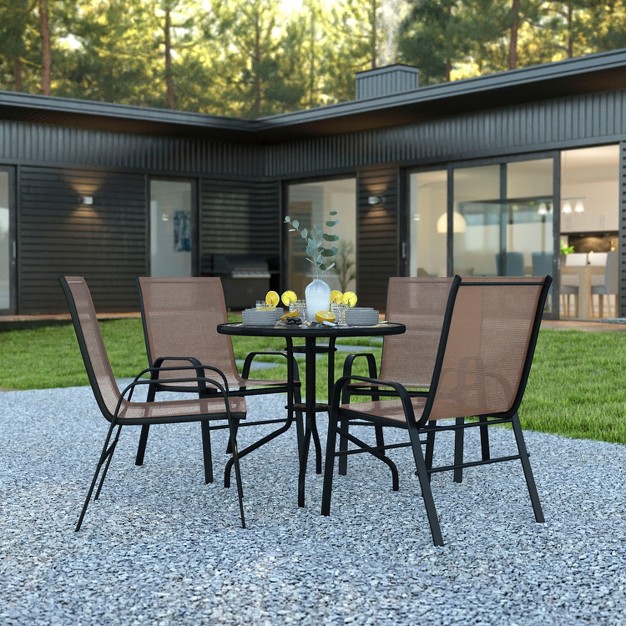 Emma And Oliver Five Piece Patio Table Set With Round Metal Table With Tempered Glass Top And 4 Flex Comfort Stacking Chairs