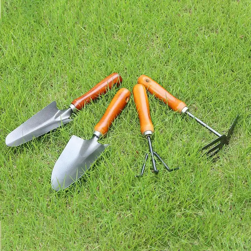 Wholesales Price Thickened 4 PCS Wooden Metal Gardening Hand Shovel Rake Tool Set Heavy Duty For Household Planting Flowers