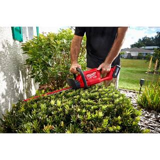 MW M18 FUEL 10 in. 18V Lithium-Ion Brushless Electric Cordless Pole Saw Kit w M18 FUEL 18 in. Hedge Trimmer  8Ah Battery 2825-21PS-3001-20