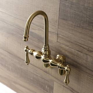 Kingston Brass Vintage 2-Handle Adjustable Center Wall Mount Claw Foot Tub Faucet in Brushed Brass HAE81T7